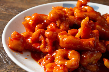 A closeup view of a plate of orange chicken.