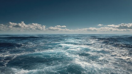 Obraz premium Calm ocean, bright sky, fluffy clouds