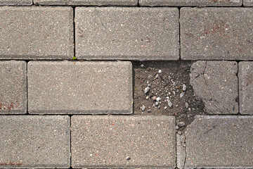 Big hole with water crack in asphalt