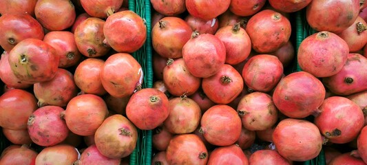 Vibrant Red Pomegranates - Top View Background
