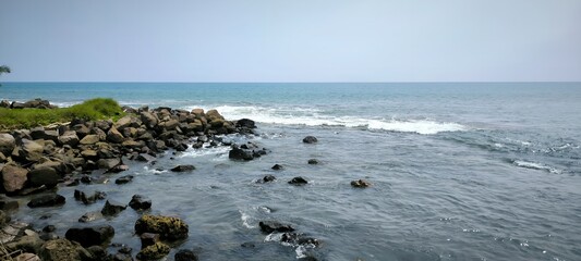 Tranquil Seascape of a Rocky Coastline and Calm Ocean