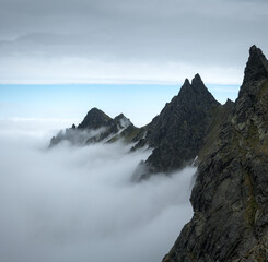 Mountain peak above the clouds, mountain landscape.
