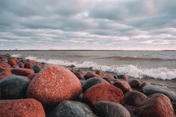Coastal rocks by a gray cloudy sea