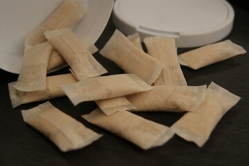 Close-up of an open box for nicotine pouches.