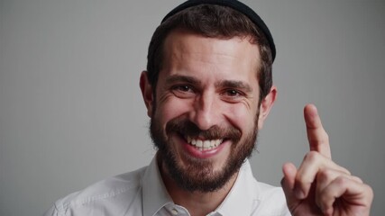 man pointing gesture indoors formal