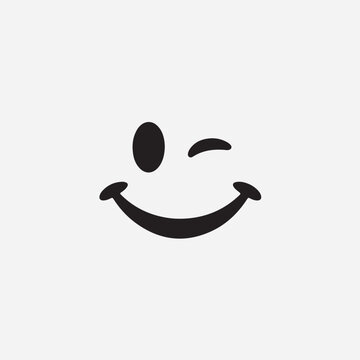Naklejki Black smiley face winking on light gray background