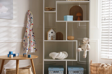 Stylish playroom with decor and furniture. Interior design