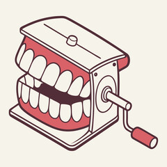 Retro wind-up toy with grinning cartoon teeth design  
