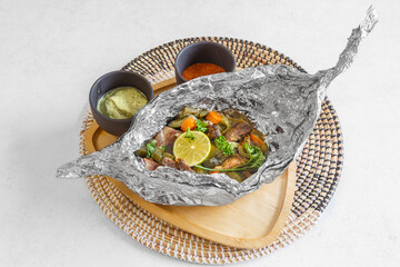 Poisson-chat en papillote – plat traditionnel congolais