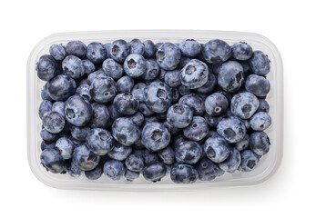 Blueberries in a plastic box on a white background. Top view