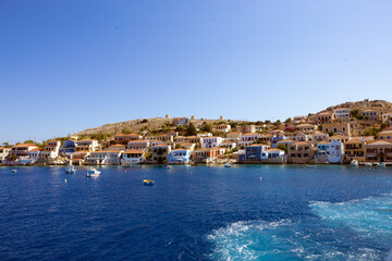 Fototapeta premium Mediterranean harbor with colorful houses and calm sea
