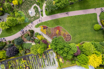 Aerial View of Public Garden with Pathways, Flowerbed, Seating Area, and Garden Plots – Botanical...
