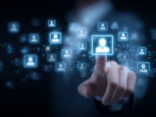 Fototapeta premium Human resource manager touching human resource network structure and checks the CV online to choose the perfect employee for company