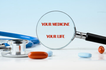 The conceptual phrase is YOUR MEDICINE YOUR LIFE. Invest in your health Concept.