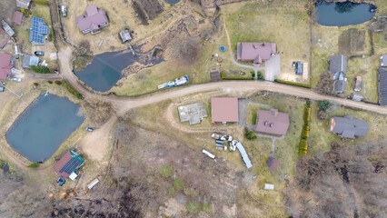 Aerial View of Rural Landscape with Houses and Ponds