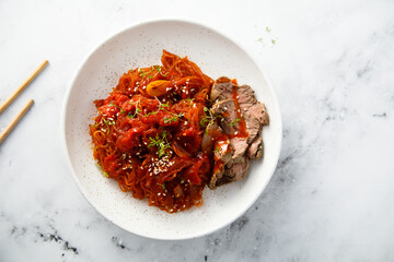 Noodles with beef and hot sauce