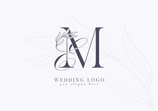 Elegant wedding logo with floral initial EM monogram