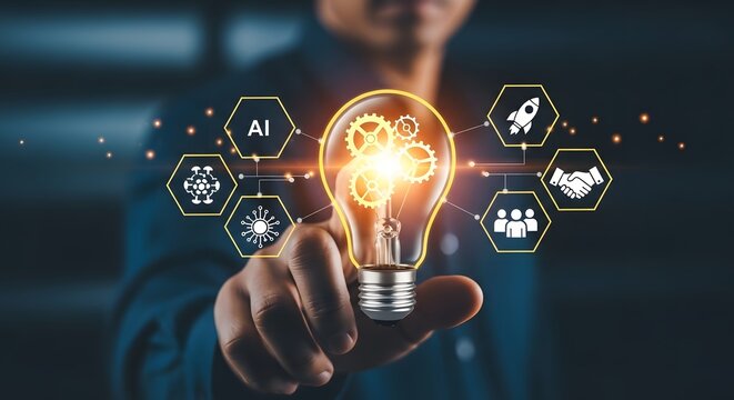 Businessman touching glowing light bulb with digital icons representing innovation and business growth.