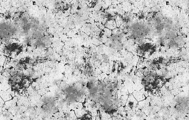 Dark, textured surface with cracks and subtle speckles