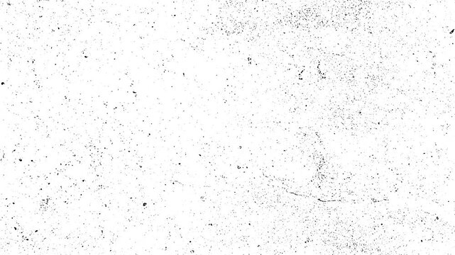 White surface with small dark spots, ideal for texture or background design in minimalist projects or naturethemed illustrations.