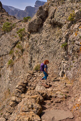 Active woman hiking in Teno mountains