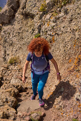 Active woman hiking in Teno mountains