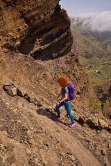 Active woman hiking in Teno mountains