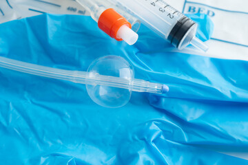 Foley catheter and urine drainage bag collect urine for disability or patient in hospital.