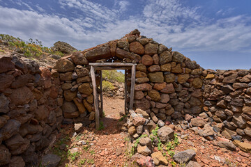 Abandoned stone house above the sea