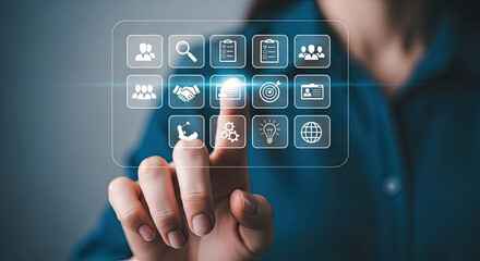 Business Technology Concept: Woman Touching Digital Interface with Teamwork, Goals, and Strategy Icons. Modern Solutions for Success and Growth.