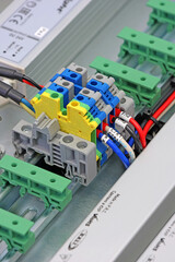 Electrical feed-through terminals for connecting copper electrical wires with metal lugs in the...