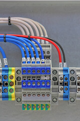 Electrical feed-through terminals for connecting copper electrical wires with metal lugs in the...