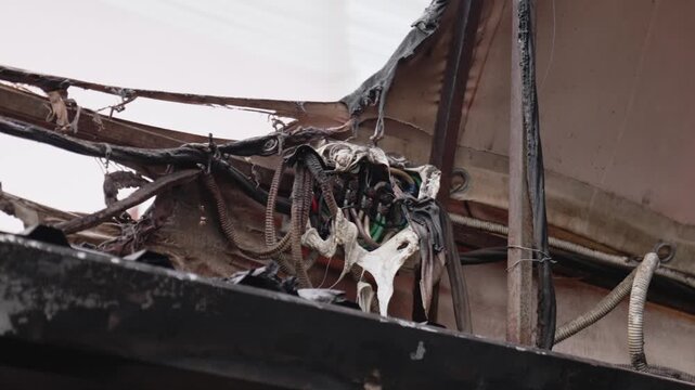 Burnt wiring. Short circuit of the electrics, which resulted in a fire. Failure to comply with safety rules during installation of electrical wiring.
