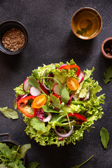 Salad of lettuce and fresh vegetables ready to eat, healthy food