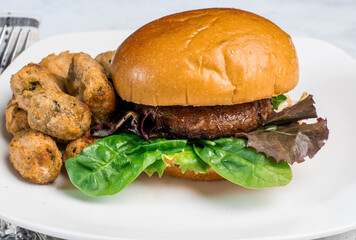portobello mushroom burger with broccoli tots