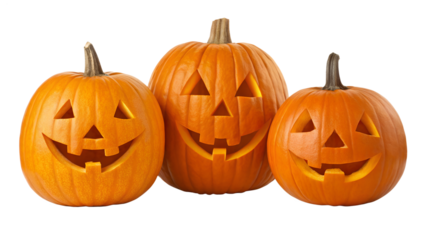 Three bright orange carved pumpkins glow with warm light, showing happy faces, isolated on a transparent PNG background for easy use.