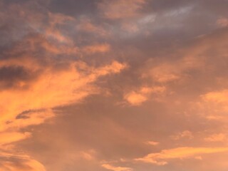 Obraz premium fantastic orange clouds, natural orange sky background