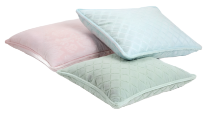 Three soft quilted throw pillows in pastel pink blue and green isolated on transparent background