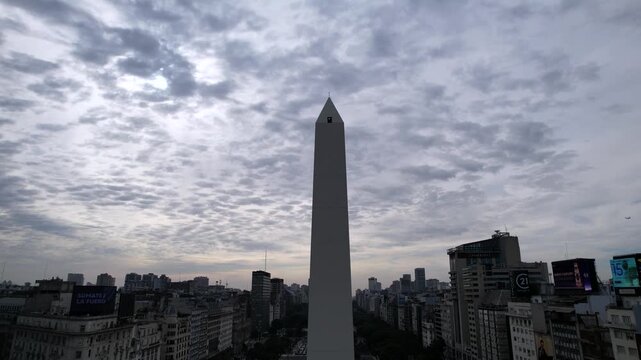 Aerial view of the Obelisk of Buenos Aires and 9 de Julio Avenue in the center of the city. The Obelisk is a symbol of Buenos Aires, is one of the most important tourist spots.