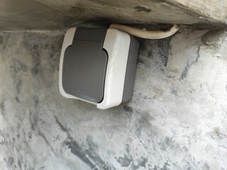 An electrical outlet on a wall.