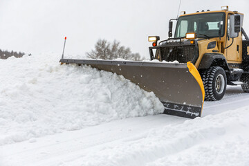 arge blade pushing aside heavy snow