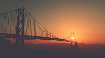 Obraz premium Golden sunrise silhouettes a suspension bridge
