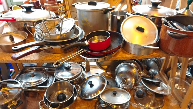 Culinary treasures await among an eclectic collection of pots and pans in a bustling kitchen environment filled with character