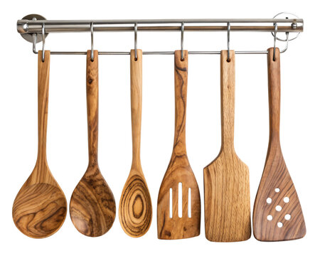 wooden kitchen utensils hanging on a metal rack, isolated PNG transparent background
