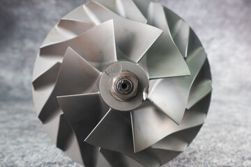 Close up Turbocharger rotor Shaft, impeller Shaft wheel turbocharger, turbine Shaft turbocharger on...