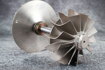 Close up Turbocharger rotor Shaft, impeller Shaft wheel turbocharger, turbine Shaft turbocharger on...