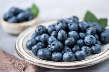Fresh blueberries in bowl, closeup view