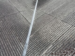 Old asbestos cement roofing sheets with rainwater drainage, asbestos roof, corrugated asbestos cement roof sheet, corrugated panels