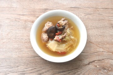 boiled cabbage stuffed mashed pork with glass noodles topping mushroom n soup on bowl
