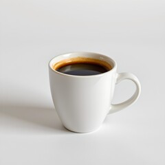 a moment of solitude, featuring a white mug filled with coffee and a small dollop of froth